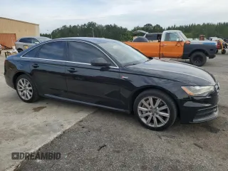 2014 Audi A6 Prestige with VIN WAUHGAFC2EN061122, listed as a Copart auction lot 57228545 with 100,234 mi miles and Salvage title. Bid and sale history available at DreamBid. Image 4.