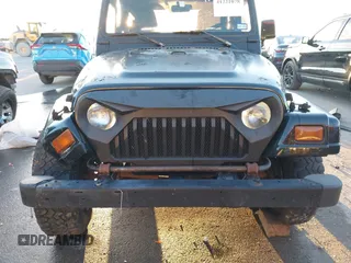 1997 Jeep Wrangler SE with VIN 1J4FY29P0VP415195, listed as a IAAI auction lot 41221078 with 137,046 mi miles. Bid and sale history available at carsss.com. Image 14.
