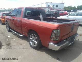 2009 Dodge Ram 1500 SLT with VIN 1D3HB18T19S727450, listed as a IAAI auction lot 40658133 with 218,203 mi miles. Bid and sale history available at carsss.com. Image 3.