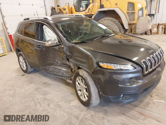 2016 Jeep Cherokee Latitude z VIN 1C4PJMCSXGW147918, wystawiony jako IAAI lot #42173947 z przebiegiem 142 482 mil mil oraz . Historia ofert i sprzedaży dostępna na DreamBid. Obrazek 1.