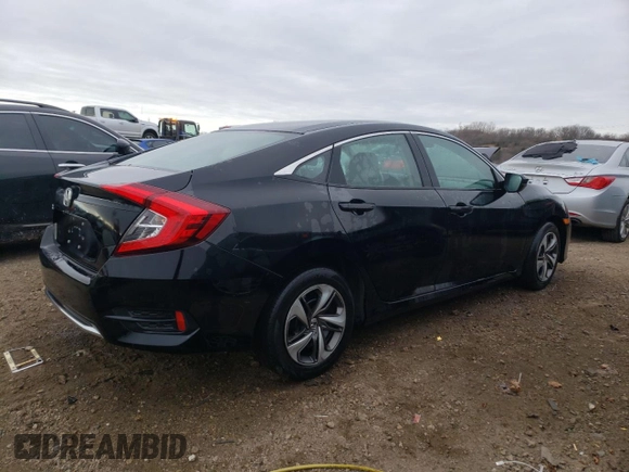 2019 Honda Civic LX with VIN 19XFC2F6XKE004169, listed as a Copart auction lot 83847414 with 65,517 mi miles and Salvage Title. Bid and sale history available at DreamBid. Image 3.