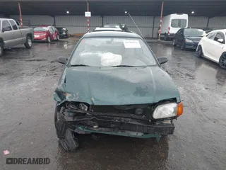 1996 Toyota Tercel DX with VIN JT2AC52L9T0127262, listed as a IAAI auction lot 41504210 with 135,732 mi miles. Bid and sale history available at carsss.com. Image 6.