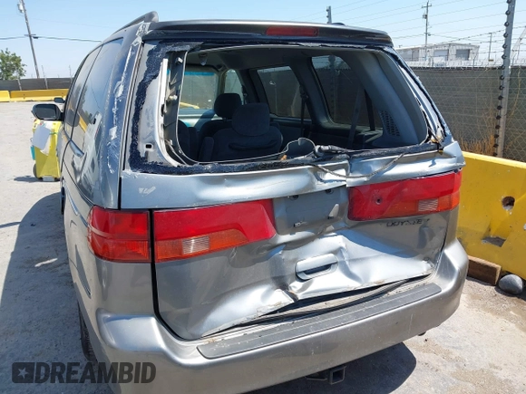 2001 Honda Odyssey EX z VIN 2HKRL18621H541553, wystawiony jako IAAI lot #42469447 z przebiegiem 241 701 mil mil oraz . Historia ofert i sprzedaży dostępna na DreamBid. Obrazek 6.