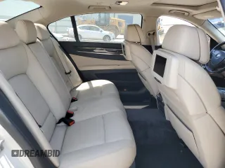 2011 BMW 7 Series 740Li z VIN WBAKB4C57BC574160, wystawiony jako Copart lot #62334395 z przebiegiem 138 771 mil mil oraz Czysty tytuł • Clean title. Historia ofert i sprzedaży dostępna na DreamBid. Obrazek 10.