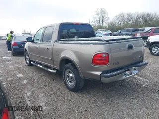 2003 Ford F-150 XLT with VIN 1FTRW07673KD34518, listed as a IAAI auction lot 41975405 with 95,775 mi miles. Bid and sale history available at carsss.com. Image 3.