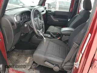 2012 Jeep Wrangler Unlimited Sport with VIN 1C4BJWDG5CL158739, listed as a Copart auction lot 51334975 with 31,818 mi miles and Salvage Title. Bid and sale history available at carsss.com. Image 7.