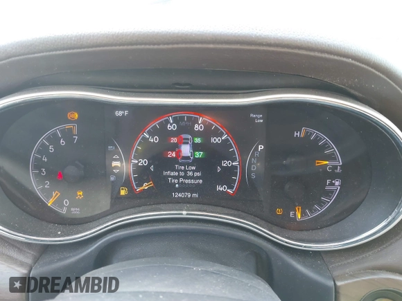 2014 Jeep Grand Cherokee Overland with VIN 1C4RJECG4EC523747, listed as a IAAI auction lot 40802143 with 124,079 mi miles. Bid and sale history available at carsss.com. Image 7.