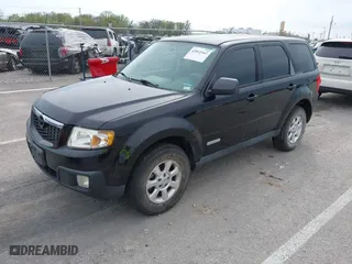 2008 Mazda Tribute Grand Touring with VIN 4F2CZ02Z48KM26109, listed as a IAAI auction lot 42011447 with 221,686 mi miles. Bid and sale history available at carsss.com. Image 2.
