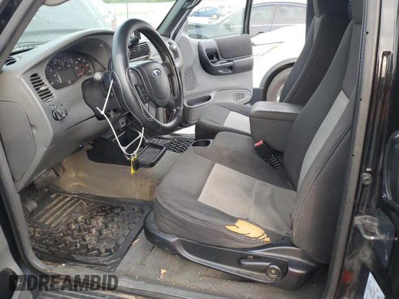 2005 Ford Ranger XLT с VIN 1FTZR45E05PA94744, выставлен на аукционе Copart как лот 52873495 с пробегом 205 139 миль миль и Списание • Salvage title. История ставок и продаж доступна на DreamBid. Изображение 7.