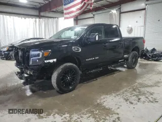 2023 Nissan Titan XD PRO-4X with VIN 1N6AA1FB4PN109300, listed as a Copart auction lot 82003064 with 15,897 mi miles and Salvage Title. Bid and sale history available at carsss.com. Image 1.