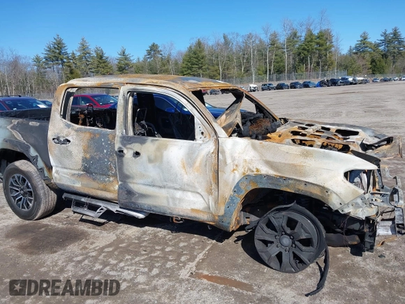 2023 Toyota Tacoma SR z VIN 3TYCZ5AN2PT132764, wystawiony jako IAAI lot #41832334 z przebiegiem 200 000 mil mil oraz . Historia ofert i sprzedaży dostępna na DreamBid. Obrazek 11.