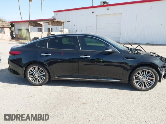 2016 Kia Optima SXL Turbo with VIN 5XXGV4L29GG086468, listed as a IAAI auction lot 41933581 with 186,881 mi miles. Bid and sale history available at carsss.com. Image 14.