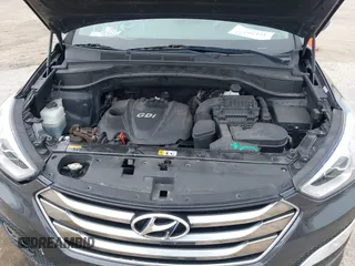 2016 Hyundai Santa Fe z VIN 5XYZU3LB0GG318165, wystawiony jako IAAI lot #42158474 z przebiegiem 74 420 mil mil oraz . Historia ofert i sprzedaży dostępna na DreamBid. Obrazek 10.