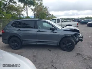 2023 Volkswagen Tiguan SE R-Line Black with VIN 3VVCB7AX1PM099075, listed as a IAAI auction lot 41600520 with 33,316 mi miles. Bid and sale history available at carsss.com. Image 13.
