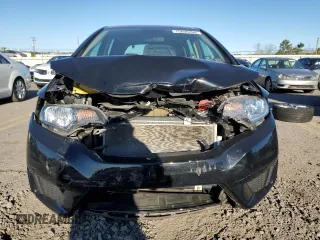 2016 Honda Fit LX with VIN 3HGGK5H56GM704864, listed as a Copart auction lot 75690264 with 54,543 mi miles and Salvage title. Bid and sale history available at DreamBid. Image 5.