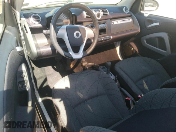 2014 Smart fortwo Pure с VIN WMEEJ3BA0EK780282, выставлен на аукционе Copart как лот 47691815 с пробегом 74 144 миль миль и Чистый • Clean title. История ставок и продаж доступна на DreamBid. Изображение 8.