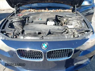 2013 BMW 3 Series 328i xDrive with VIN WBA3B3G54DNR80235, listed as a IAAI auction lot 42105883 with 144,023 mi miles. Bid and sale history available at carsss.com. Image 10.