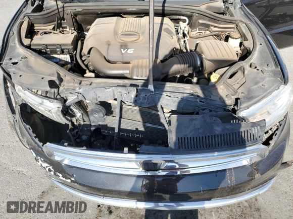 2015 Dodge Durango SXT with VIN 1C4RDHAG2FC931046, listed as a Copart auction lot 52409775 with 164,509 mi miles and Salvage title. Bid and sale history available at DreamBid. Image 12.