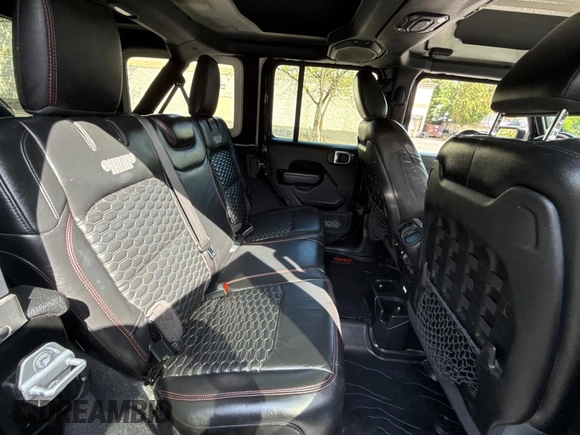 2020 Jeep Wrangler Unlimited Rubicon with VIN 1C4HJXFGXLW234368, listed as a Copart auction lot 54793055 with 56,852 mi miles and Salvage Title. Bid and sale history available at carsss.com. Image 6.