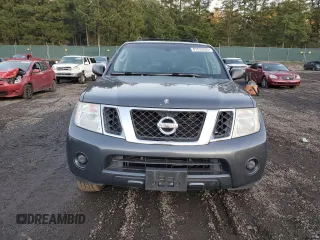 2010 Nissan Pathfinder SE z VIN 5N1AR1NB1AC602296, wystawiony jako Copart lot #87575225 z przebiegiem 216 996 mil mil oraz Czysty tytuł • Clean title. Historia ofert i sprzedaży dostępna na DreamBid. Obrazek 5.