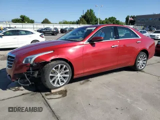 2016 Cadillac CTS Luxury Collection AWD with VIN 1G6AX5SX0G0128548, listed as a Copart auction lot 62783985 with 52,899 mi miles and Salvage title. Bid and sale history available at DreamBid. Image 1.