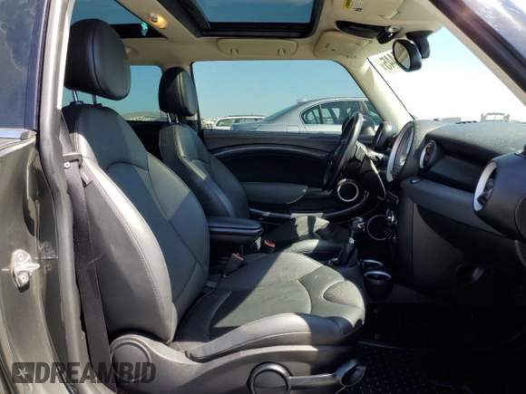 2012 MINI Hardtop S with VIN WMWSV3C57CTY16657, listed as a Copart auction lot 62812445 with 122,796 mi miles and Salvage title. Bid and sale history available at DreamBid. Image 10.