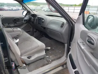 2000 Ford F-150 XL with VIN 1FTRX17L6YKA30614, listed as a IAAI auction lot 42110031 with Not provided miles and . Bid and sale history available at DreamBid. Image 5.
