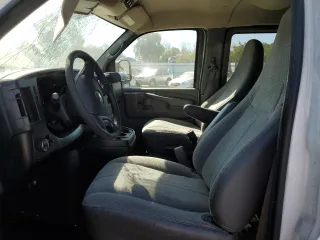 2012 Chevrolet Express Passenger 1LT with VIN 1GAZG1FG4C1100252, listed as a Copart auction lot 73242444 with 76,779 mi miles and Salvage Title. Bid and sale history available at carsss.com. Image 7.