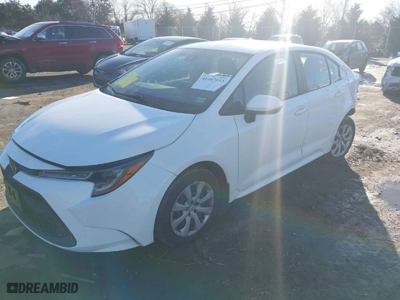 2021 Toyota Corolla LE with VIN 5YFEPMAE9MP163793, listed as a IAAI auction lot 41487015 with 71,984 mi miles. Bid and sale history available at carsss.com. Image 2.