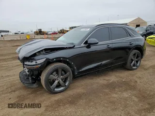 2023 Genesis GV70 2.5T z VIN KMUMADTB5PU117687, wystawiony jako Copart lot #54448095 z przebiegiem 27 887 mil mil oraz Szkody całkowita. Historia ofert i sprzedaży dostępna na DreamBid. Obrazek 1.