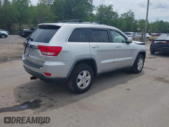 2011 Jeep Grand Cherokee Laredo with VIN 1J4RR4GG3BC734683, listed as a IAAI auction lot 42656716 with 151,220 mi miles and . Bid and sale history available at DreamBid. Image 4.