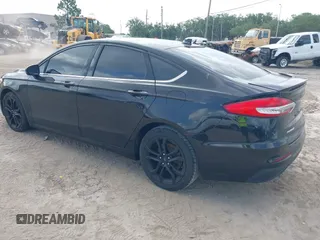 2020 Ford Fusion SE with VIN 3FA6P0HD4LR236433, listed as a IAAI auction lot 42440932 with 94,975 mi miles and . Bid and sale history available at DreamBid. Image 3.