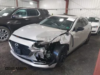 2024 Mazda 3 2.5 Turbo Premium Plus with VIN 3MZBPBEY4RM411598, listed as a IAAI auction lot 41987945 with 11,903 mi miles. Bid and sale history available at carsss.com. Image 2.