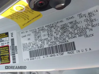 2014 Toyota Tacoma with VIN 5TFLU4EN1EX103052, listed as a IAAI auction lot 41653270 with 121,656 mi miles. Bid and sale history available at carsss.com. Image 9.