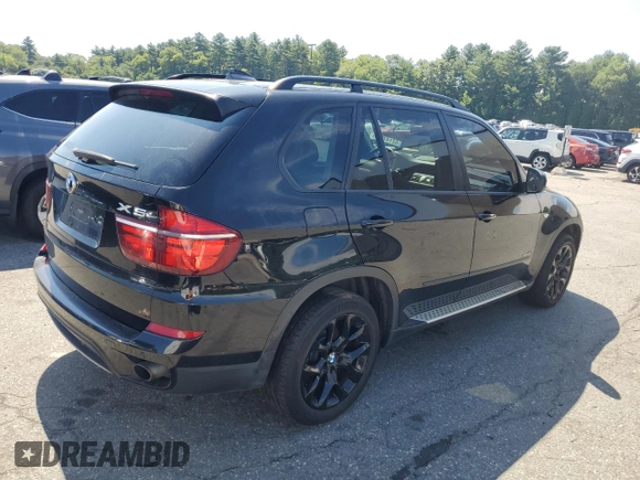 2012 BMW X5 35i with VIN 5UXZV4C54CL752079, listed as a Copart auction lot 62147515 with 147,244 mi miles and Clean title. Bid and sale history available at DreamBid. Image 3.