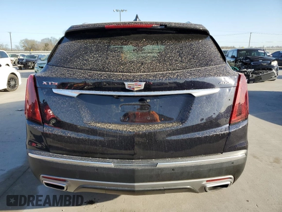 2021 Cadillac XT5 FWD Premium Luxury with VIN 1GYKNCRS5MZ138712, listed as a Copart auction lot 49697945 with 54,893 mi miles and Salvage Title. Bid and sale history available at carsss.com. Image 6.