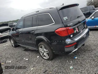 2016 Mercedes-Benz GL with VIN 4JGDF7DE9GA683041, listed as a Copart auction lot 51802315 with 128,755 mi miles and Salvage Title. Bid and sale history available at carsss.com. Image 2.