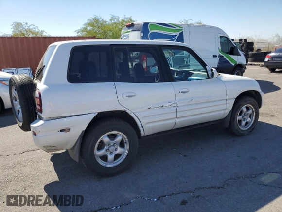 2000 Toyota RAV4 with VIN JT3HP10V0Y7164016, listed as a Copart auction lot 72999754 with 215,880 mi miles and Salvage Title. Bid and sale history available at carsss.com. Image 3.