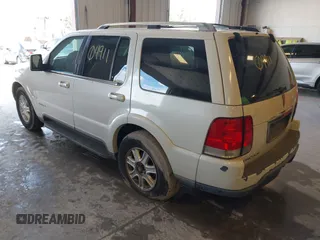 2003 Lincoln Aviator Luxury z VIN 5LMEU68H23ZJ45606, wystawiony jako IAAI lot #42304911 z przebiegiem 234 998 mil mil oraz . Historia ofert i sprzedaży dostępna na DreamBid. Obrazek 3.