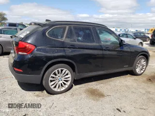 2014 BMW X1 xDrive28i z VIN WBAVL1C5XEVY16263, wystawiony jako Copart lot #52242225 z przebiegiem 154 951 mil mil oraz Szkoda całkowita • Salvage title. Historia ofert i sprzedaży dostępna na DreamBid. Obrazek 3.