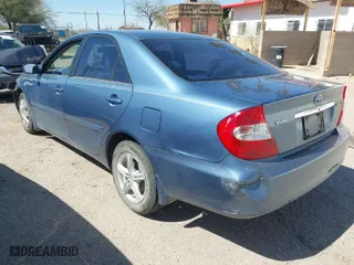 2004 Toyota Camry LE with VIN 4T1BE32K04U907223, listed as a IAAI auction lot 41795149 with 82,411 mi miles. Bid and sale history available at carsss.com. Image 3.