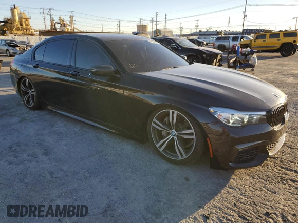 2017 BMW 7 Series 740i with VIN WBA7E2C38HG741255, listed as a Copart auction lot 39926213 with 76,321 mi miles. Bid and sale history available at carsss.com. Image 4.