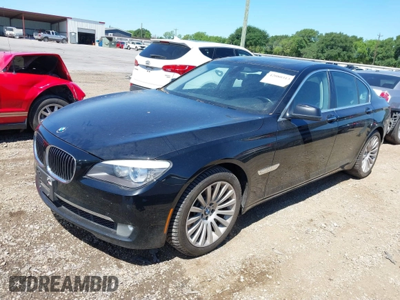 2012 BMW 7 Series 750i with VIN WBAKA8C50CCY37892, listed as a IAAI auction lot 42080313 with 148,058 mi miles. Bid and sale history available at carsss.com. Image 2.