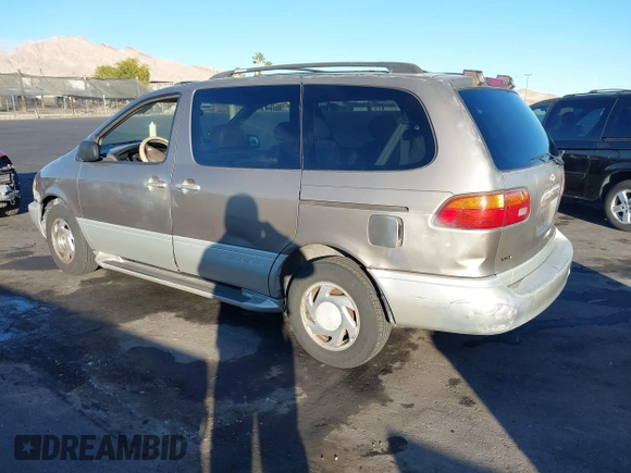 1998 Toyota Sienna LE z VIN 4T3ZF13C1WU051030, wystawiony jako IAAI lot #41259605 z przebiegiem 190 861 mil mil oraz . Historia ofert i sprzedaży dostępna na DreamBid. Obrazek 3.