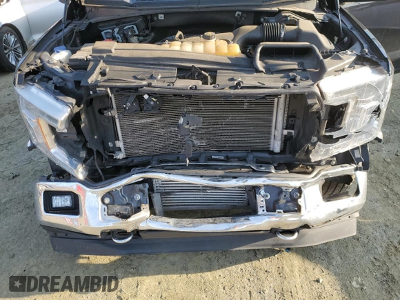 2020 Ford F-150 XL with VIN 1FTEW1EP8LFC00965, listed as a Copart auction lot 42652045 with 92,000 mi miles and Salvage Title. Bid and sale history available at carsss.com. Image 11.