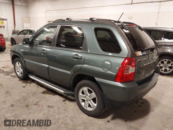 2009 Kia Sportage LX with VIN KNDJE723097558182, listed as a IAAI auction lot 41295142 with 147,200 mi miles. Bid and sale history available at carsss.com. Image 3.