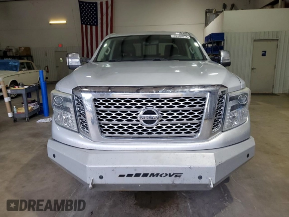 2016 Nissan Titan XD PRO-4X with VIN 1N6BA1F45GN506049, listed as a Copart auction lot 70746074 with 153,093 mi miles and Salvage Title. Bid and sale history available at carsss.com. Image 5.