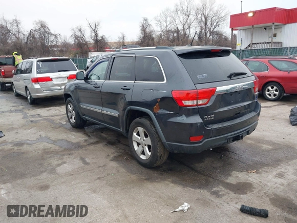 2013 Jeep Grand Cherokee Laredo with VIN 1C4RJFAG9DC506238, listed as a IAAI auction lot 41800981 with 172,676 mi miles. Bid and sale history available at carsss.com. Image 3.