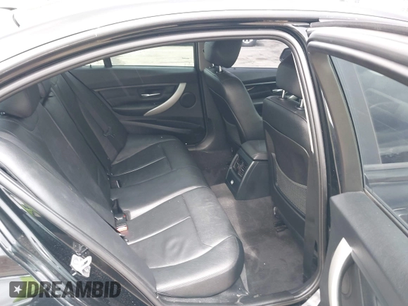 2014 BMW 3 Series 320i with VIN WBA3B1G52ENS80039, listed as a IAAI auction lot 42253717 with 104,388 mi miles and . Bid and sale history available at DreamBid. Image 8.