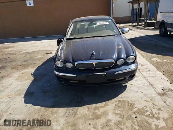2008 Jaguar X-Type z VIN SAJWA51A38WJ36788, wystawiony jako Copart lot #73103604 z przebiegiem 192 416 mil mil oraz Szkoda całkowita • Salvage title. Historia ofert i sprzedaży dostępna na DreamBid. Obrazek 11.